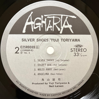 Yuji Toriyama – Silver Shoes